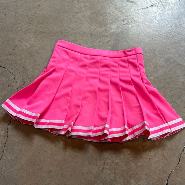 Cheer Skirt Bright Pink - ****Says Adult Small On Tag But Is Much More Of A Kids Size**** Never Worn Waist 24 In Length 12 In Preppy Pink Bottoms For School, Pink Fitted Bottoms For Cheerleading, Fitted Pink Bottoms For Cheerleading, Pink Mini Length Tennis Skirt For School, Cute Pink Skort For Party, Cute Fitted Pink Tennis Skirt, Cute Pink Party Skort, Trendy Pink Skort For School, Pink Preppy Skirted Tennis Skirt