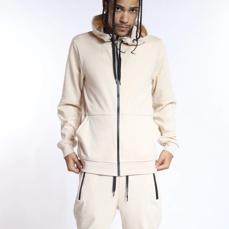 Our New Tech Fleece Hoodie And Jogger Set In Sand Color. These Comfy Stylish Jogger Set Are Perfect For Everyday And Casual Styling. Drawstring Closure Elasticated Waistband & Amkle Zip Up Pockets 55% Cotton 40% Polyester 5% Spandex Model Is 5'10 & Wear M/32 Winter Fleece Tracksuit In Athleisure Style, Sporty Beige Hoodie With Pockets, Sporty Fleece Outerwear For Leisure, Beige Hoodie For Streetwear In Athleisure Style, Beige Hoodie For Streetwear Athleisure, Sporty Cream Sweatshirt With Pockets, Cream Sporty Sweatshirt With Pockets, Beige Athleisure Hoodie For Streetwear, Sporty Cream Hoodie With Pockets