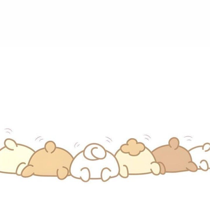 a group of stuffed animals laying on top of each other in the same row,