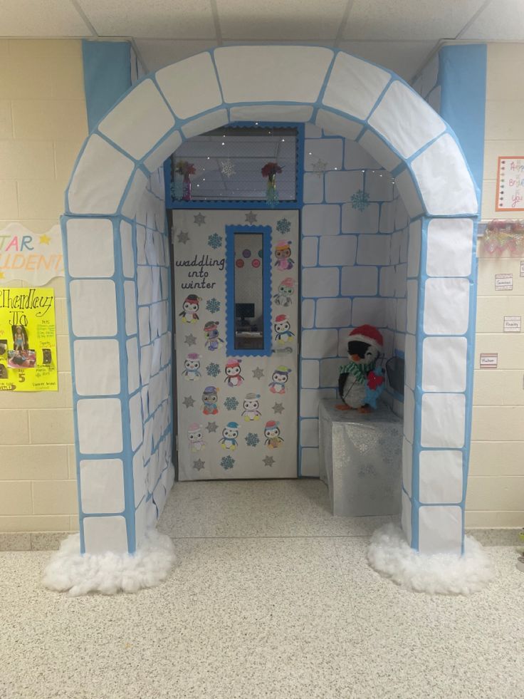 a room with a door decorated like a snowman