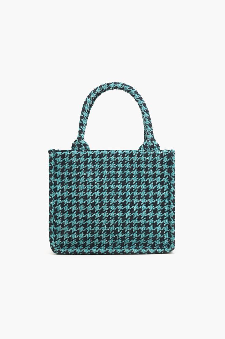 The classic Houndstooth pattern takes on a fresh and modern twist in shades of blue.High-quality embroidery threads in varying shades create a harmonious and captivating color palette. This exquisite accessory seamlessly blends timeless elegance with personalized craftsmanship, offering a unique and stylish addition to your wardrobe Multi Purpose Bag Top handle Stunning Hand embellished beading and threadwork Top magnetic fastening Detachable shoulder strap with lace details Handcrafted by artisans Bag Dimensions:13"X 11.5"X 5.5" Handmade by artisans in India Blue Bags With Braided Top Handles, Blue Top Handle Bags With Braided Handles, Rectangular Houndstooth Pattern Bag For Daily Use, Rectangular Houndstooth Bag For Daily Use, Daily Use Rectangular Bag With Houndstooth Pattern, Chic Houndstooth Shoulder Bag For Daily Use, Blue Woven Shoulder Bag, Blue Woven Shoulder Bag With Double Handle, Everyday Blue Woven Shoulder Bag