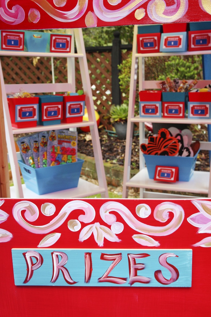 a red and blue display case filled with boxes