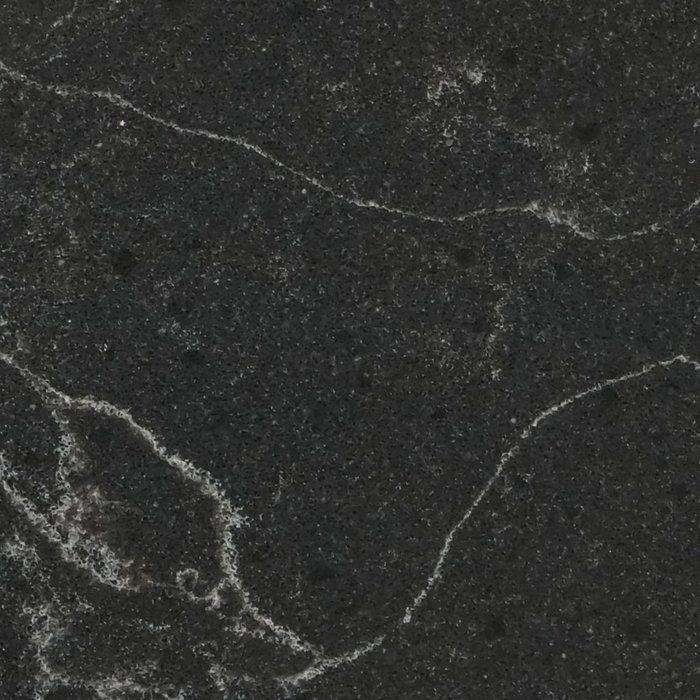 black marble with white swirls on it