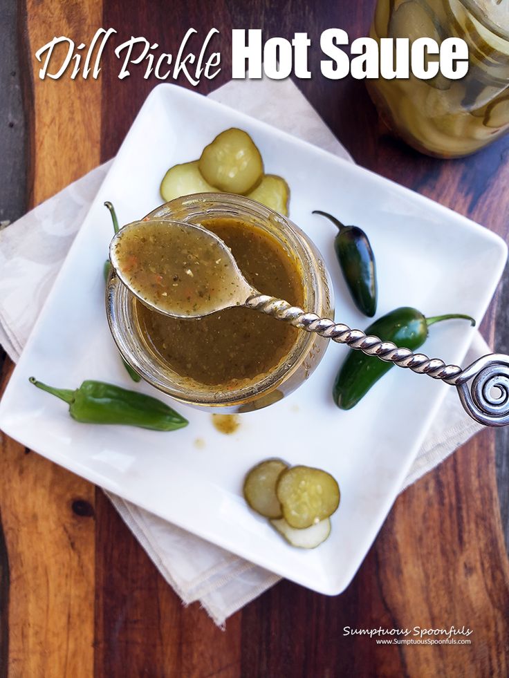 pickle hot sauce in a jar on a white plate