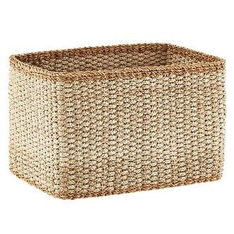 a large woven basket on a white background