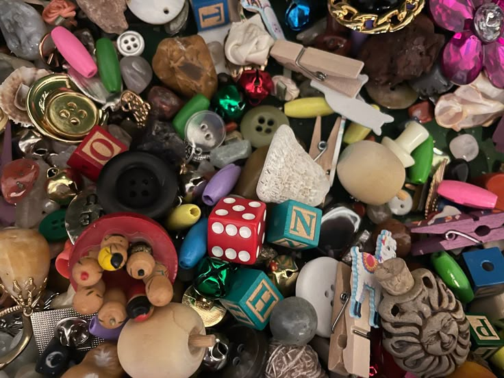 a pile of assorted buttons and other items