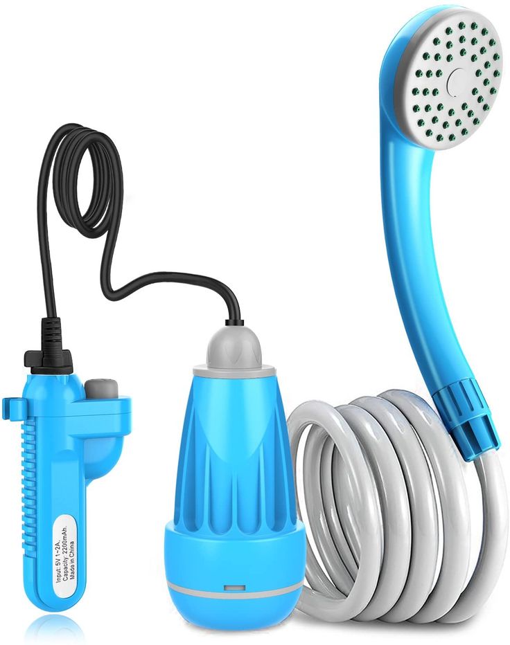 a blue and white hair dryer sitting next to an extension cord