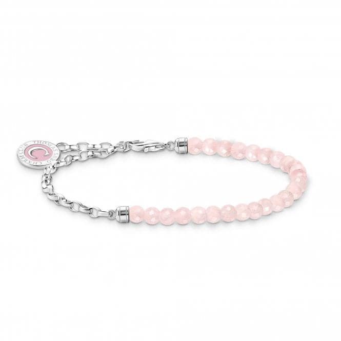 Charm Club Charmista Pink Cold Enamel Rose Quartz Bracelet A2130-067-9 Charm holder: Link bracelet with rose quartz beads – Fascinating look thanks to the combination of a wide anchor chain style link bracelet with a rose quartz beaded bracelet – Elaborately designed end caps with engraved lines – Round, engravable THOMAS SABO Charm Club Charmista coin with pink cold enamel – Can be combined with different charm pendants – Available in different lengths Height approx. 4,0 mm (0,16 Inch) Width approx. 4,0 mm (0,16 Inch) Thickness approx. 2,5 mm (0,10 Inch) Length bridge approx. 11,0 mm (0,43 Inch) Thomas Sabo Jewellery will come complete with matching packaging (*packaging images are for demonstration purposes - may vary from images shown)N.B. DUE TO OFFER PRICES OFFER ITEMS DO NOT COME WIT Cold Enamel, Rose Quartz Bracelet Beads, Thomas Sabo Charms, Charm Holder, Anchor Chain, Rose Quartz Bracelet, Rose Quartz Beads, Quartz Beads, Quartz Bracelet