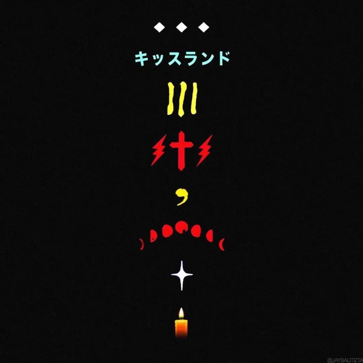 an image of the cross and candles lit up in the night sky with japanese writing on it