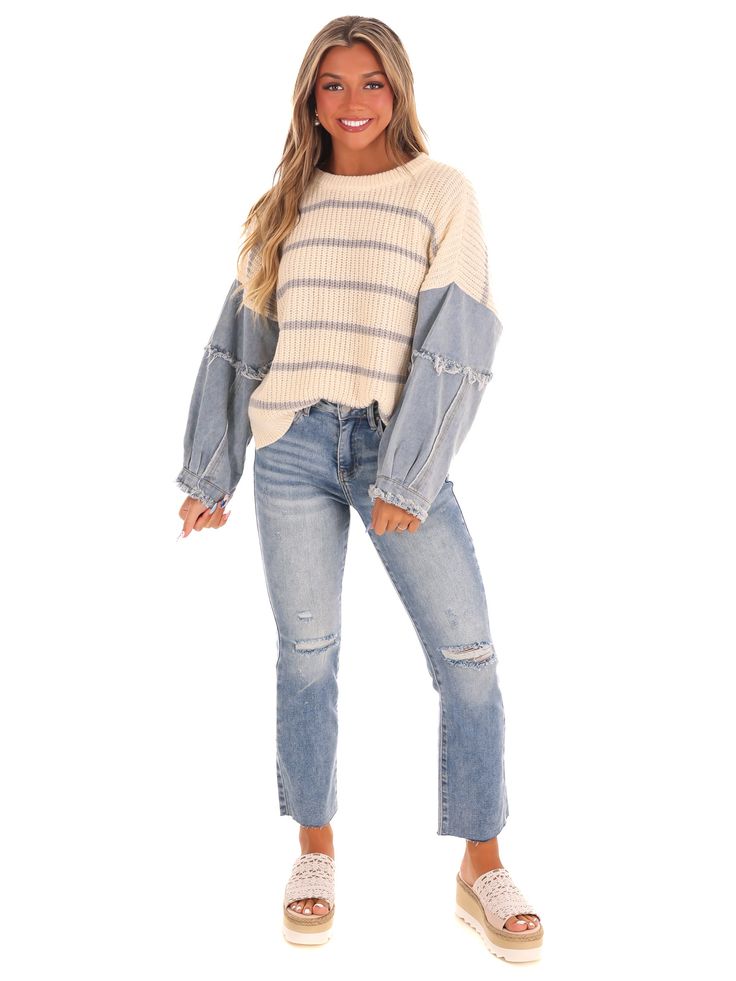 Stay cozy and cool with our Chill Chaser Stripe Sweater! This unique knit sweater features eye-catching horizontal lines and unexpected denim sleeves. Perfect for adding a touch of playful style to your winter wardrobe. Trendy Sweater With Striped Sleeves For Fall, Knit Sweater With Striped Sleeves For Fall, Casual Sweater With Striped Sleeves For Fall, Fall Striped Sleeve Sweater For Layering, Fall Layering Sweater With Striped Sleeves, Casual Striped Sleeves Sweater For Fall, Trendy Cream Cotton Sweater, Knit Tops With Striped Sleeves For Fall, Fall Knit Top With Striped Sleeves