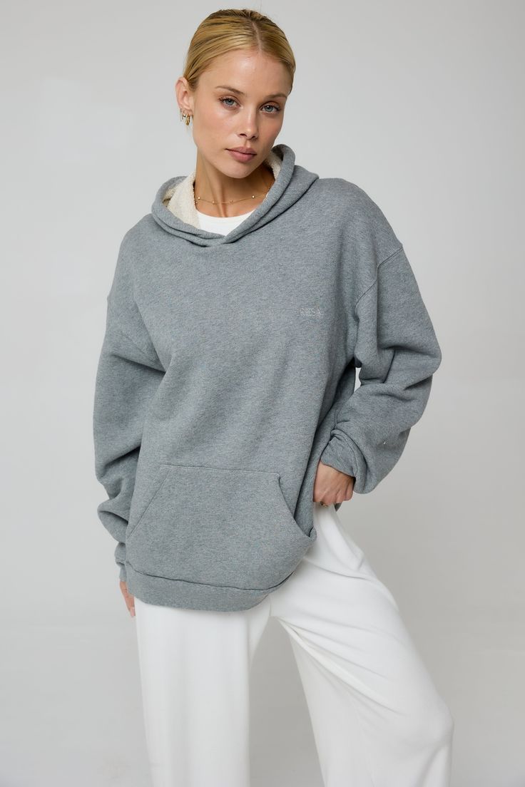 Oversized fit Hooded sweatshirt with front pockets Fabric: 100% French terry cotton Machine wash cold, low heat Model Measurements: Height 5'8, Bust 32B, Waist: 25/26", Hips 34" Model is wearing a size XS/S Made in Los Angeles Comfortable Sweatshirt With Adjustable Hood For Loungewear, Hoodie Sweatshirt With Adjustable Hood For Loungewear, Cozy Fit Sweats With Adjustable Hood For Loungewear, Comfy Gray Hoodie For Loungewear, Cozy Fit Sweatshirt With Adjustable Hood For Loungewear, Cozy Fit Gray Hoodie For Loungewear, Relaxed Fit Hooded Cozy Sweats, Comfy Relaxed Fit Sweats With Drawstring Hood, Relaxed Fit Hoodie With Drawstring For Loungewear