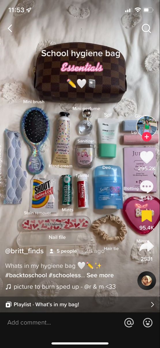 the contents of a purse are displayed on a bed