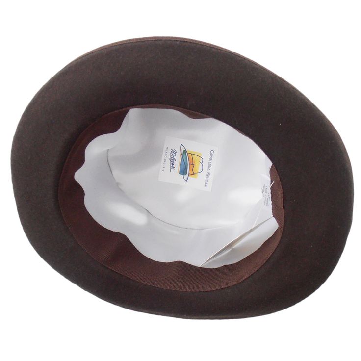 Wool felt top hat, handmade in Italy in our workshop, dome 12/14 cm and brim 4,5/5 cm, with ribbon grosgrain. Lining inside. The hat is made in 20 working days. 100% wool felt Made in Italy Attention pls. Custom item, hand-made on request and measure, according to law, the right of withdrawal is not allowed Classic Brimmed Felt Hat, Brown Fur Felt Top Hat For Formal Occasions, Classic Felt Hat With Curved Brim, Formal Brown Fur Felt Top Hat, Adjustable Felt Cloche Hat In Classic Style, Brown Fur Felt Brimmed Top Hat, Brown Brimmed Fur Felt Top Hat, Classic Adjustable Felt Cloche Hat, Classic Felt Hat With Short Brim