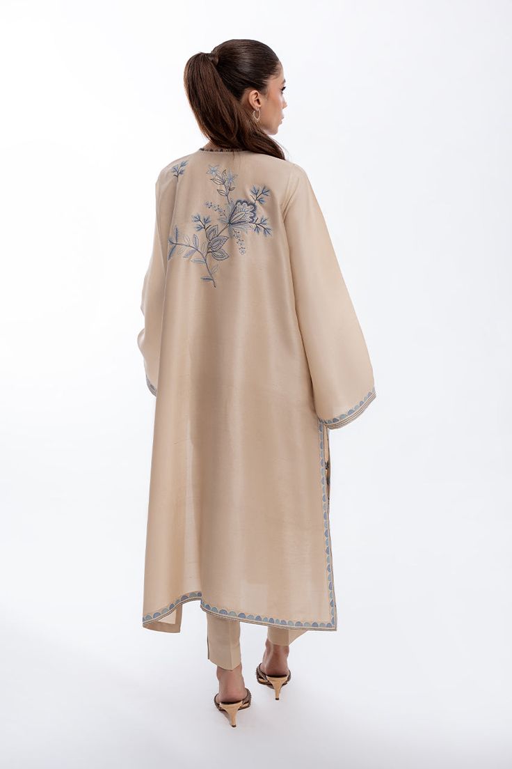 Elana Spring Palazzo Set In Raw Silk With Straight Kurta, Spring Raw Silk Palazzo Set With Straight Kurta, Raw Silk Palazzo Set With Straight Kurta For Spring, Spring Palazzo Set With Straight Kurta In Raw Silk, Unstitched Raw Silk Straight Kurta Kaftan, Festive Silk Sets With Embroidered Neckline, Spring Silk Kaftan With Resham Embroidery, Elegant Silk Tunic In Straight Kurta Style, Spring Embroidered Cotton Silk Salwar Kameez