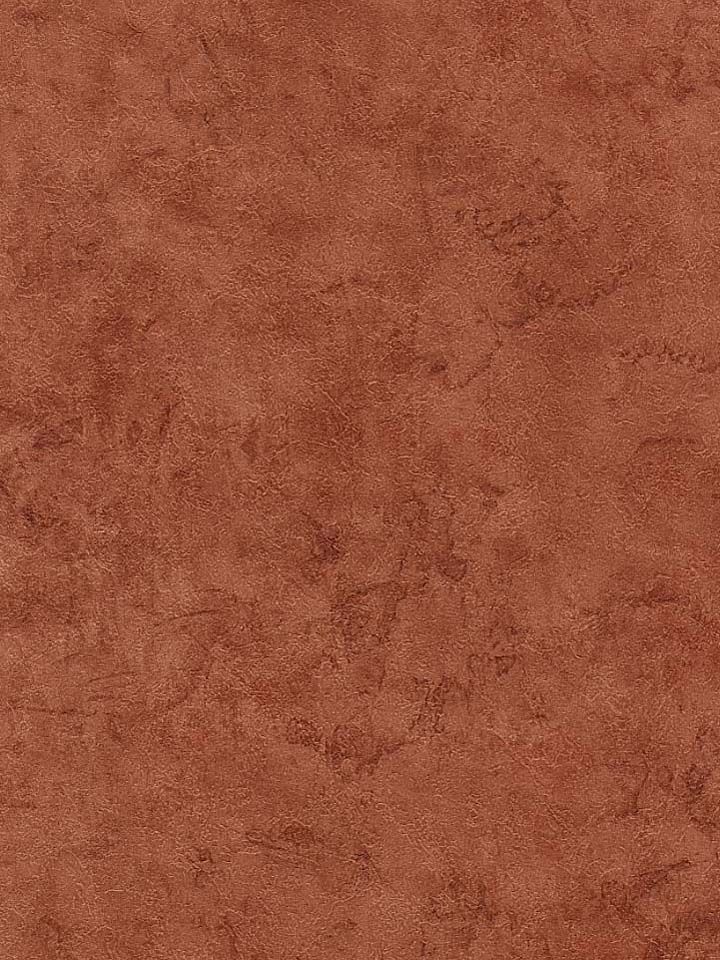 a brown wall with some dirt on it