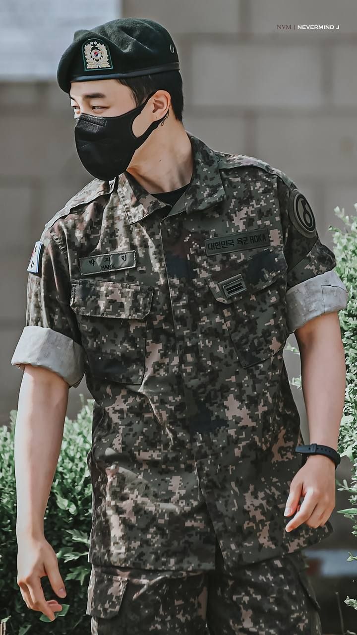 a man wearing a face mask and uniform