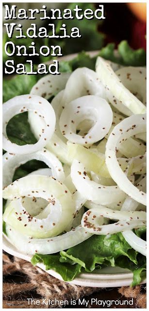 an onion salad on a plate with lettuce and tomatoes in the background text reads marinated viaala, onion salad