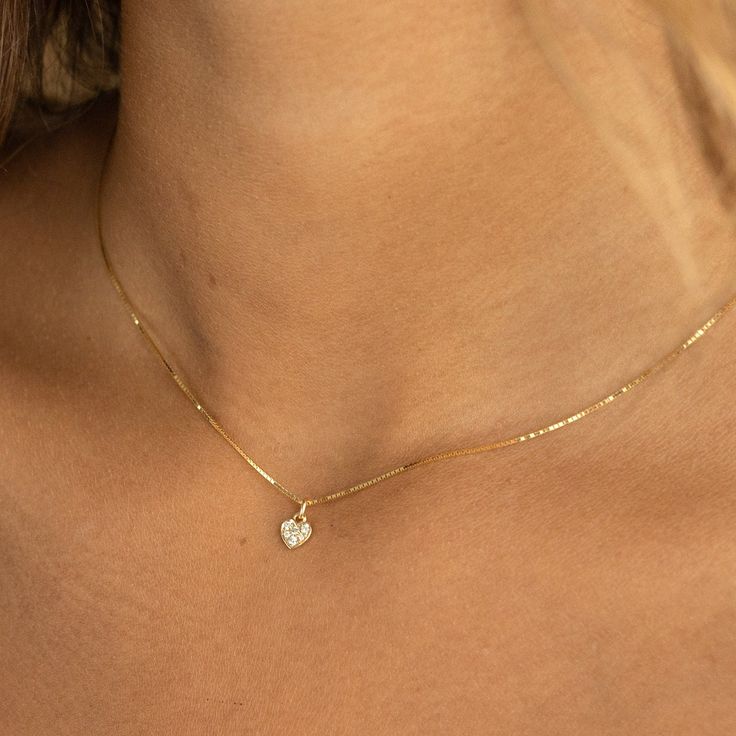 "14k Solid Gold Tiny Diamond Heart Necklace, Minimal Diamond Necklace, Mini Diamond Hear Pendant, Simple Mini Necklace, Layering Necklace Materials:  14k solid yellow gold necklace with 0.06 TCW pavé diamond pendant on a delicate box style chain.    Sizing:  Available in 16, 18 and 20\" chain lengths. Heart pendant is approximately 6.5 x 5.5mm wide.  💕 We love our customers! Have confidence in buying from us - we work to make every customer 100% happy! 💪 Gold PLATED to last you years of use! H Dainty 14k Gold Heart Pendant Jewelry, Delicate Yellow Gold Heart Pendant Jewelry, 14k Gold Jewelry With Delicate Heart Pendant, 14k Gold Delicate Heart Cut Chain Jewelry, Minimalist Yellow Gold Heart Cut Jewelry, Delicate 14k Yellow Gold Heart Necklace, 14k Gold Heart Necklace With Delicate Chain For Anniversary, Delicate Yellow Gold Heart Necklaces, Minimalist Heart Cut Gold Plated Jewelry