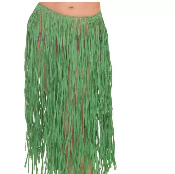 a woman wearing a green skirt with long fringes