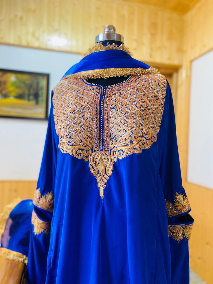 "Make a statement at any party or function with our crepe suit, showcasing the finest pure tilla Kashmiri traditional work. With no lining needed, this breathable outfit paired with an organza dupatta is perfect for hot summers." ● crepe suit can be customised in any material  ● Crafted in Kashmir ● Traditionally embroidered by our artisans ● Can Also Be Customised In colours, sizes, Fabric and details of your choice (write to us) DETAILS -Embroidery : Tilla  Work -Length : 44 {111.7cm} Inches [ Kashmiri Winter Suits Design, Kashmiri Suits Winter, Tilla Work Embroidery, Kashmiri Tilla Suit Designs, Kashmiri Kani Suits, Kashmiri Tilla Suit, Kashmiri Suits, Cotton Suit Designs, Dress Clothes