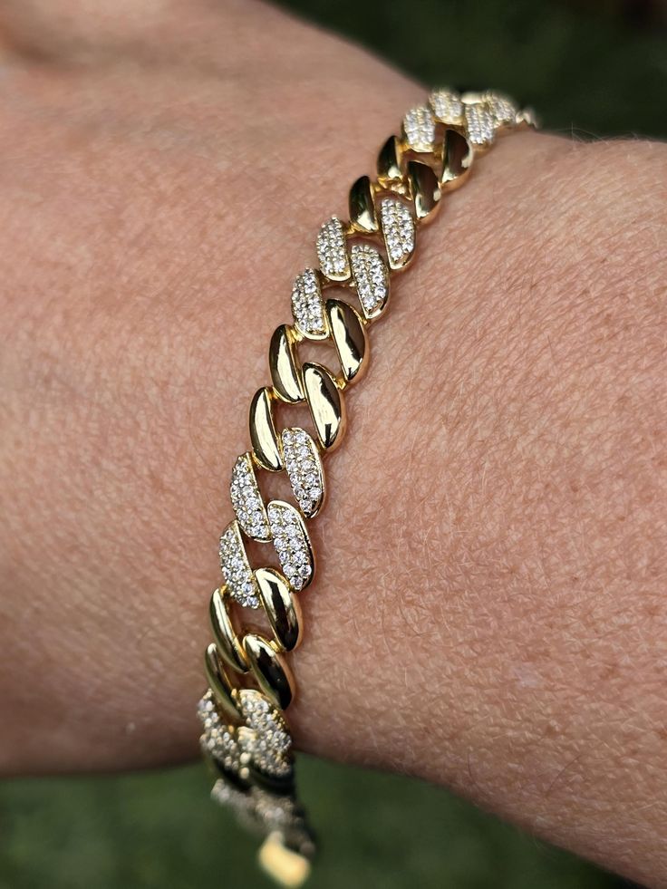 Nice chunky curb bracelet  Cubic zirconia 10mm wide 17-19cm long  Removable extension  Unisex Gold Cuban Link Chain Bracelet With Cubic Zirconia, Cuban Link Bracelet With Cubic Zirconia, Cuban Link Chain Diamond Bracelet With Cubic Zirconia, Gold Curb Chain Bracelet With Cubic Zirconia, Adjustable Cuban Link Chain Bracelet, Cubic Zirconia Curb Chain Bracelet Gift, Cuban Link Chain Bracelet With Diamond Accents, Cuban Link Cubic Zirconia Bracelet As Gift, Jubilee Bracelet Link Jewelry With Cubic Zirconia