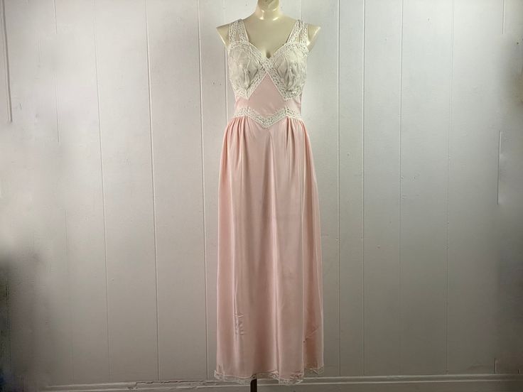 "Vintage 1940s pink dressing gown, lingerie. Made of Acetate/Nylon. Bias cut with white lace trim and sheer cups. Label:Elysee 54. About a size small/medium, C cup . Actual measurements are: about 37\" around the bust 30\" around the waist 47\" around hips 56\" overall length In excellent unused condition, New Old Stock." Pink Dressing Gown, Pink Gowns, 1940s Dresses, Vintage Lingerie, Backless Dress Formal, Women Lingerie, White Lace, Lace Trim, Gowns Dresses