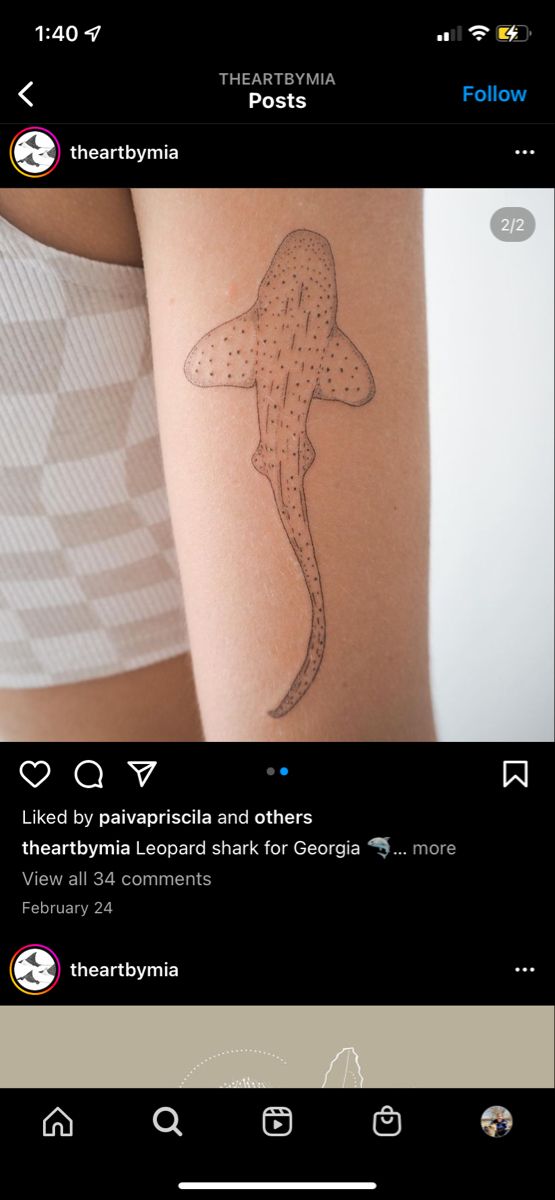 a tattoo on the back of a woman's arm