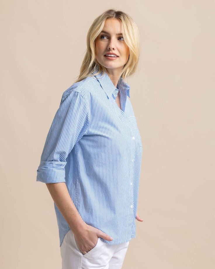 Polished and professional, this long-sleeve button-down gives you timeless style from the boardroom to the boardwalk. Our soft cotton top features a shirt tail hem and button cuffs for a custom fit that's both sophisticated and casual. Style: 10871 Classic Blouse With Relaxed Fit And Shirttail Hem, Unstructured Long Sleeve Shirt For Daywear, Relaxed Fit Long Sleeve Dress Shirt For Daywear, Classic Shirt With Shirttail Hem For Fall, Classic Blouse With Rolled Sleeves For Business Casual, Classic Tops With Roll-up Sleeves For Business Casual, Classic Shirt With Cuffed Sleeves For Business Casual, Classic Shirt With Rolled Sleeves For Daywear, Classic Shirt With Roll-up Sleeves For Daywear