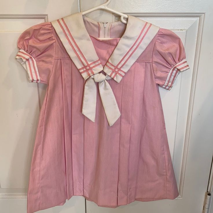 Little Girl’s Pink And White Vintage Sailor Dress. Pleated Dress With White Sailor Collar And Pink Trim. Never Worn!! Sailor Collar Cardigan, Fitted Pink Dress For School, Preppy Pink School Dress, Pink Preppy Cotton Dress, Vintage Dresses For School In Spring, Cute Pink School Dress, Pink Cotton School Dress, Pink Cotton Dress For School, Classic School Dresses For Spring