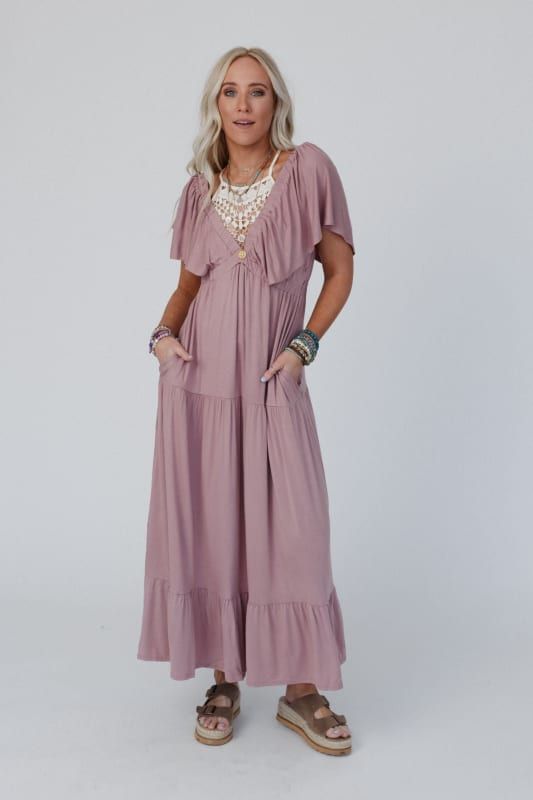 You're going to wear the On Repeat Open Back Ruffle Maxi Dress to every occasion because of how great it makes you feel! It's featured in a comfortable lightweight knit fabric in a maxi silhouette, tiered ruffle skirt, flattering ruffle v-neckline with ruffle sleeves, and an open back. Pair with a cute bralette like ou Ruffle Maxi Dress, Tiered Ruffle Skirt, Padded Bralette, Mauve Dress, Ruffled Maxi Dress, Ruffle Sleeves, On Repeat, Ruffle Skirt, Lightweight Knit