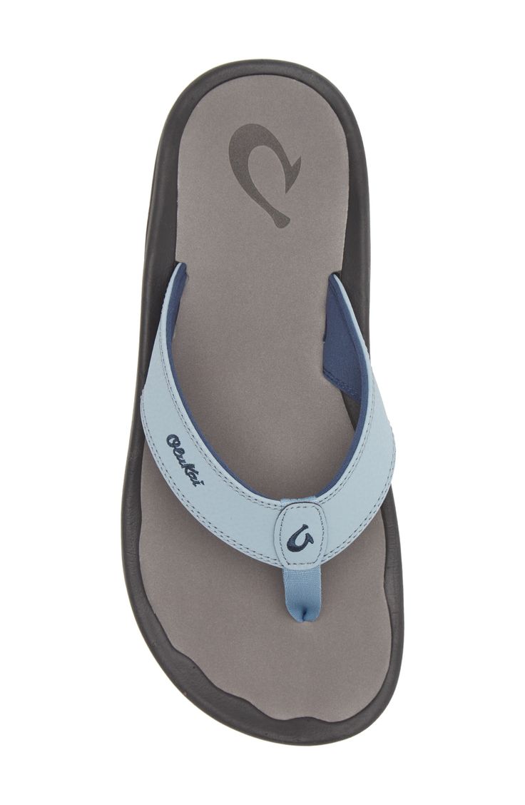 Classic beach-ready sandal features a cushioned anatomical footbed and can be machine washed for easy care. Synthetic upper/textile lining/rubber sole. By OluKai; imported. Men's Shoes. Casual Foam Flip Flops With Textured Footbed, Casual Foam Sandals With Rubber Sole, Water Sports Sandals With Arch Support And Round Toe, Leather Beach Sandals With Gel Cushioning, Leather Sandals With Gel Cushioning For Beach, Comfortable Foam Sandals With Branded Insole, Synthetic Sport Sandals With Cushioned Footbed For Surfing, Comfortable Synthetic Flip Flops With Ortholite Insole, Adjustable Sandals With Arch Support For Surfing