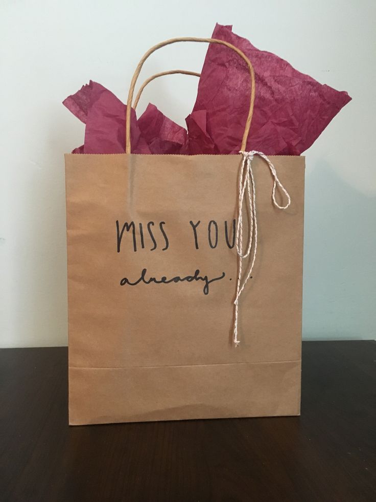 a brown paper bag with the words miss you always written on it