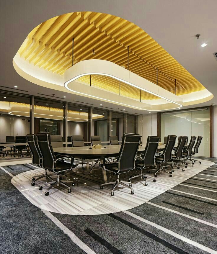 an empty conference room with chairs and tables