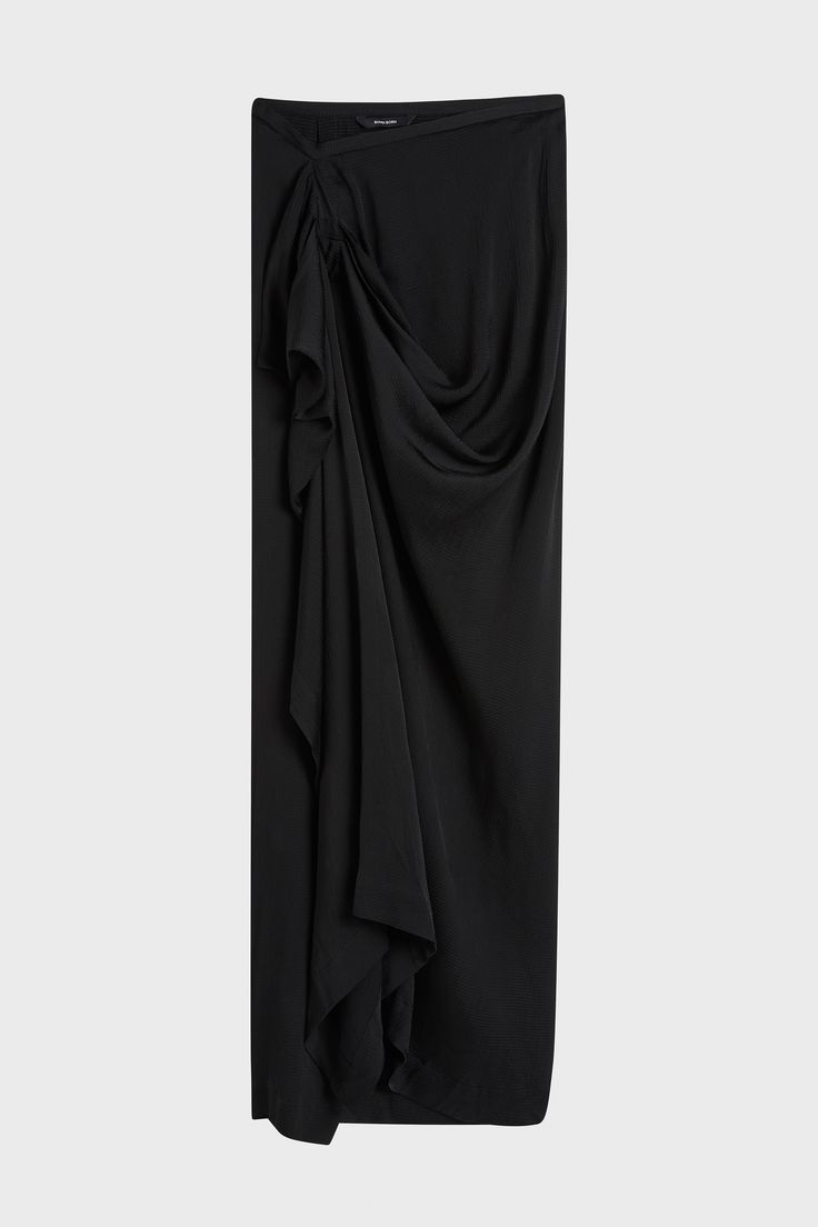 The Ardea Draped Skirt in Black is an elegant and versatile wardrobe staple crafted from a fluid viscose blend with a hammered satin finish, chosen for its elegant drape. This floor length skirt features flattering draping across the left hip and a zip closure at centre back. Pair with Ardea tops for an elevated day to night look. Luxury fabric sustainably made in Europe. Elegant Black Draped Bottoms, Formal Pre-draped Flowy Skirt, Black Formal Draped Skirt, Black Draped Flowy Skirt, Black Flowy Draped Skirt, Evening Draped Ruched Maxi Skirt, Ruched Draped Maxi Skirt For Evening, Chic Black Draped Maxi Skirt, Silk Ruched Draped Skirt