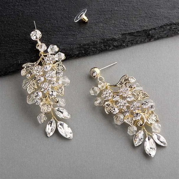 Crystal%20Drop%20Earrings%20in%20Gold%0D%0AYou'll%20adore%20wearing%20these%26nbsp%3Bgorgeous%20hand-wired%20gold%20plated%20bridal%20earrings%20sparkling%20with%20brilliant%20crystals%20and%20rhinestones.%26nbsp%3B%0D%0AThese%20drop%20wedding%20earrings%20glisten%20with%20faceted%20clear%20crystal%20beads%20and%20marquise%20shaped%20Austrian%20crystal%20rhinestones%20in%20a%20gold-plated%20floral%20design.%20The%20perfect%20accessory%20for%20the%20bride%20or%20her%20bridesmaids.%0D%0ASize%3A%202%203%2F4%22%20long%20and%201%22%20wide.%0D%0AColor%3A%20Gold%2FClear.%0D%0AStyle%3A%204623-G.%0D%0ANeed%20several%20pair%20of%20earrings%20for%20your%20wedding%20party%3F%20You%20can%20buy%20in%20bulk%20and%20save!%0D%0APlease%20allow%201%20week%20for%20delivery.%0D%0AShipping%20Policy.%0D%0AReturn Gold Wedding Accessories, Rose Gold Statement Earrings, Rose Gold Earrings Wedding, Rose Gold Bridal Earrings, Statement Earrings Wedding, Crystal Statement Earrings, Bridal Statement Earrings, Crystal Earrings Wedding, Gold Earrings Wedding