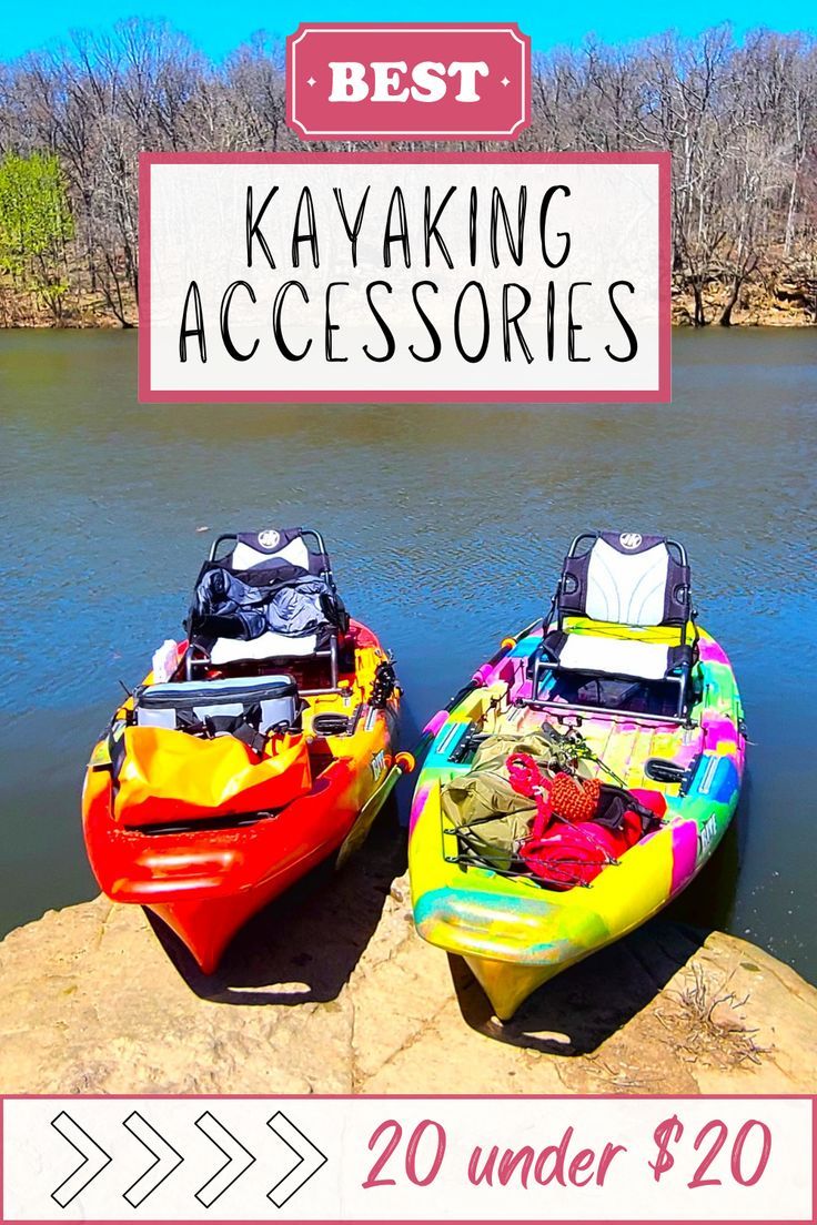 two colorful kayaks sitting on top of a rock next to a body of water