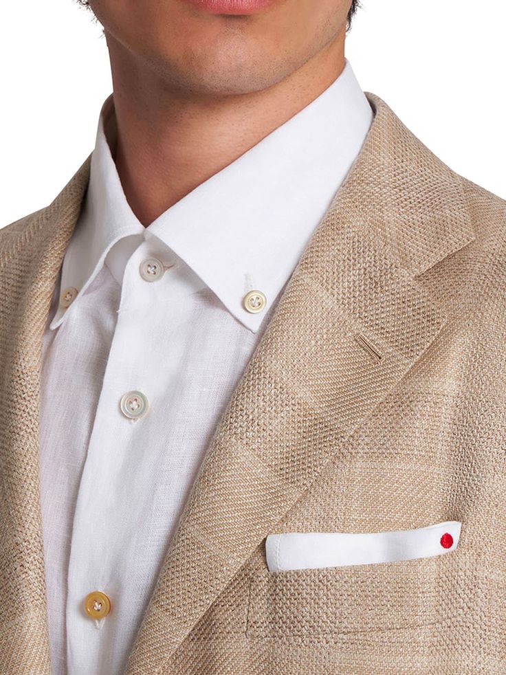 Beige single-breasted jacket with a check motif, crafted in an exclusive combination of cashmere, wool, silk and linen. Finely crafted textiles have always been a cornerstone at Kiton: in our wool mill in Biella, Italy, constant experimentation has given rise to the creation of innovative textures and fibres, paying special attention to sustainability and the environment. The deconstructed nature of the garment and the use of soft yarn offer an authentic, personal experience of refined comfort that combines allure and freedom of movement with a focus on relaxed elegance. The cornerstones of the Kiton wardrobe change without losing their substance. The precision of haute couture blends with the comfort of leisurewear. Every Kiton jacket is a masterpiece of design, entirely cut and sewn by h Beige Tweed Jacket With Lapel Collar For Semi-formal Occasions, Luxury Linen Tweed Jacket With Notch Lapel, Luxury Tweed Jacket With Patch Pockets For Semi-formal, Formal Linen Outerwear With Patch Pockets, Luxury Linen Business Tweed Jacket, Luxury Linen Tweed Jacket For Business, Timeless Linen Blazer For Business, Classic Single Breasted Linen Tweed Jacket, Tailored Luxury Linen Blazer