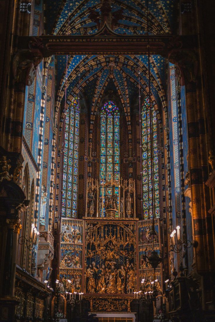 the inside of a church with stained glass windows