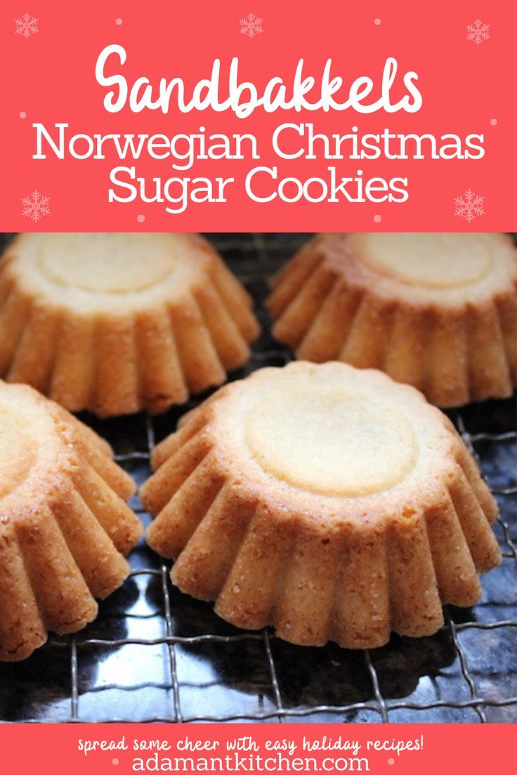 some cookies are cooling on a rack with the words sandbakes norwegian christmas sugar cookies