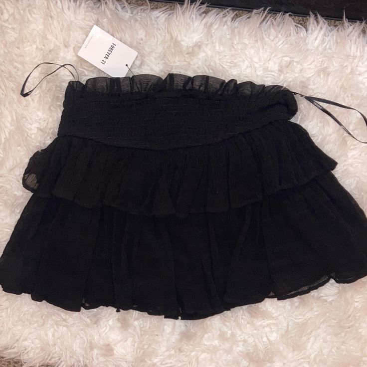 Black Ruffle Skirt, Size M, Nwt Chic Ruffled Mini Skirt For Date Night, Flowy Mini Skirt For Date Night, Spring Tiered Skirt For Date Night, Party Skort With Ruffle Hem, Chic Tiered Mini Skirt For Date Night, Ruffle Hem Skort For Party, Flirty Lined Skirt For Date Night, Black Tiered Skirt With Ruffles, Black Bottoms With Ruffle Hem For Night Out