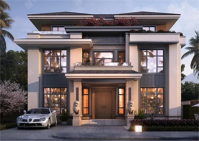 a car is parked in front of a two story house with balconies on the second floor