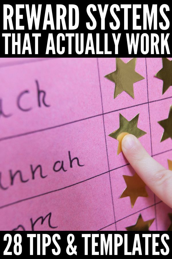 a hand pointing at some stars on top of a pink sheet of paper with the words reward systems that actually work