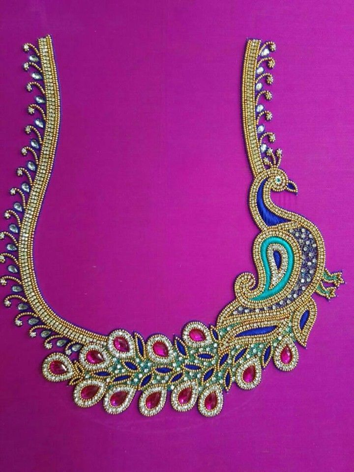 an elaborate necklace is displayed on a purple background