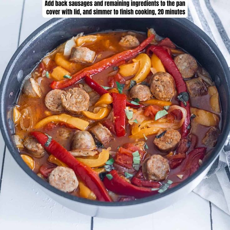 a pan filled with meatballs and peppers