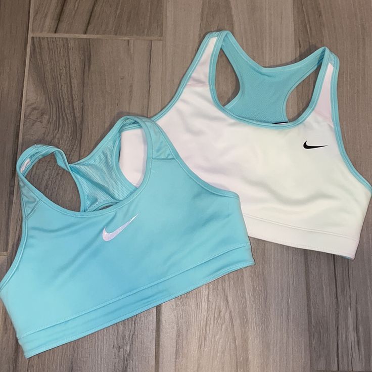 Nwt Girls Nike Aports Bra. Reversible. One Side Is White, The Other Is Light Blue. Size Large Stretch Sports Bra For Workout, Blue Sporty Activewear For Cheerleading, Blue Nike Sports Bra For Training, Nike Blue Sports Bra For Training, Nike Sporty Blue Sports Bra, White Sporty Activewear For Cheerleading, White Athleisure Activewear For Cheerleading, Track Wishlist, Nike Fits