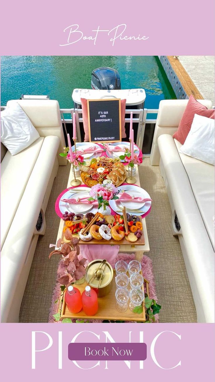 a table filled with food on top of a boat