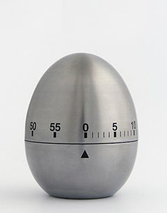 an egg shaped thermometer on a white background