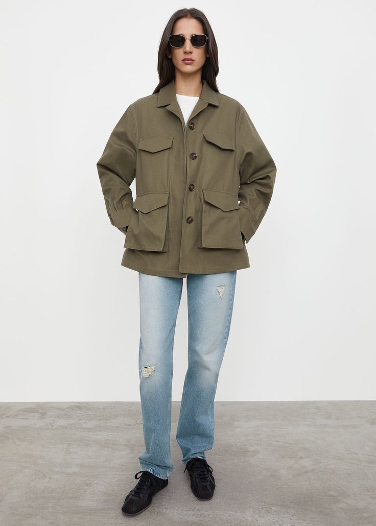 Army-inspired jacket cut from a Japanese cotton fabric. It’s shaped to an oversized silhouette with a concealed button fastening, a nipped-in waist at the back, buttoned cuffs, and utility pockets with built-in slanting side pockets. Dress up with trousers and a silk scarf this spring.