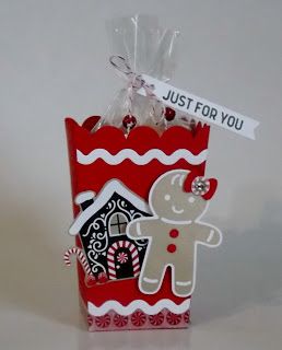 a red bag with a gingerbread cut out of it