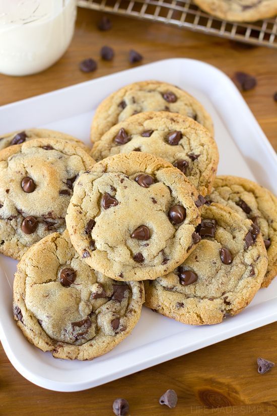 chocolate chip cookies on a square white plate